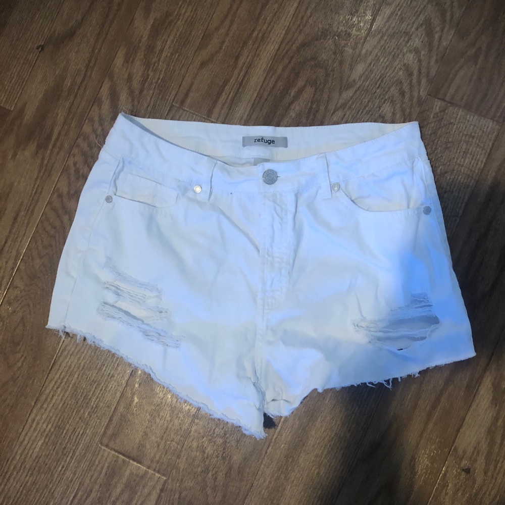 Distressed white shorts